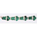 A Victorian malachite bracelet
set with harebell and shamrock flower heads mounted in 9ct gold., 7