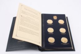 The Churchill Centenary MedalsA set of 24 silver gilt medallions showing the achievements of