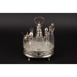 A silver and glass condiment set 
hallmarked Birmingham 1881, with single oil decanter, single