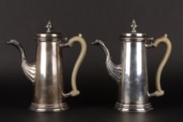 A pair of George III style late 20th century silver coffee potswith Sheffield import marks and