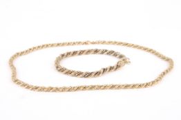 A 9ct gold two tone necklace and matching braceletof rope twist form., Bracelet 7 inches long. 21.5