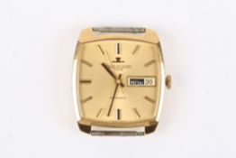 An 18ct gold Jaeger le Coultre automatic wrist watch, the cushion shaped gilded dial with baton