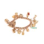 A 9ct gold curb link charm bracelet
set with 14 charms, including an unusual tin of pilchards charm,