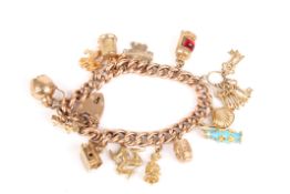 A 9ct gold curb link charm braceletset with 14 charms, including an unusual tin of pilchards charm,