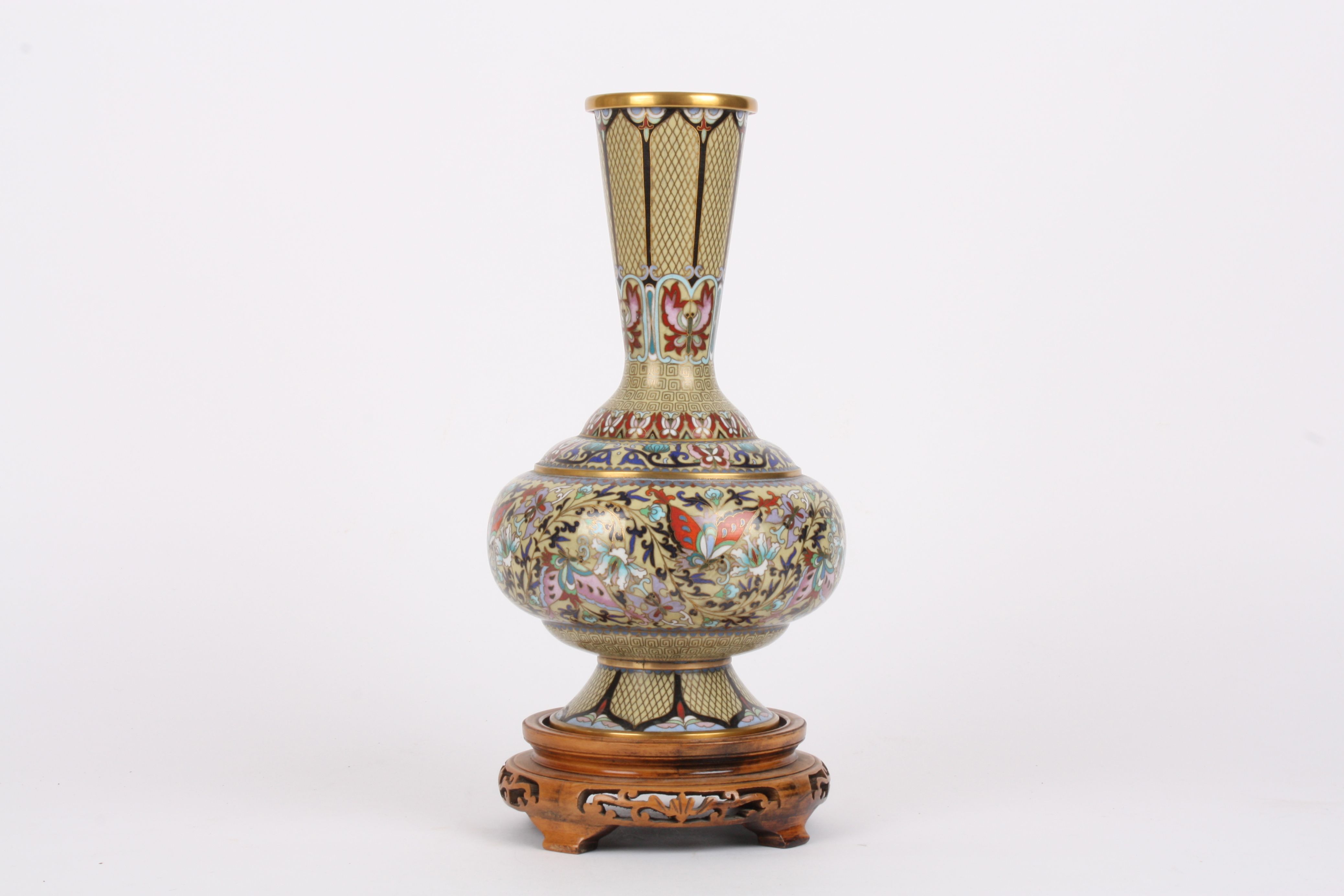 A 20th century Chinese cloisonné enamel baluster vase
the flared neck with reticulated ground and