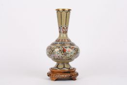 A 20th century Chinese cloisonné enamel baluster vasethe flared neck with reticulated ground and