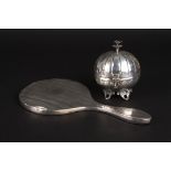 A Continental white metal melon shaped box and cover
with hinged lid, the body with repoussé