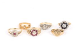 A group of six assorted ringscomprising two diamond and ruby rings, a gold and diamond ring, a