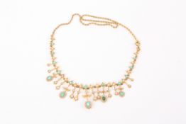 An Edwardian turquoise and pearl floral fringe necklaceEtruscan style with graduating cluster