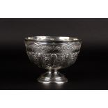 An Edwardian silver repoussé rose bowl
hallmarked Chester 1901, with embossed and scrolled