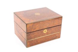 A late 19th century vanity case/travelling dressing setthe burr walnut veneered case with brass