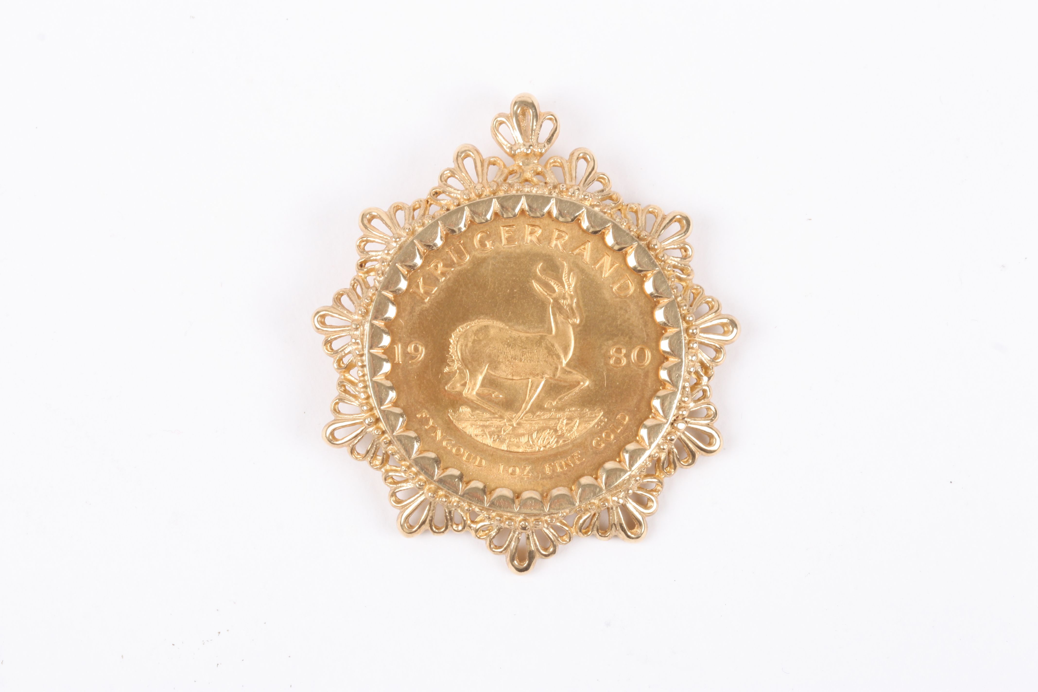 A 1980 South African full Krugerand
in a 9ct gold pendant mount., Approx 44 grams total.Condition: