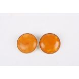 A pair of 9ct gold mounted butterscotch amber coloured earrings
the amber roundels set in 9ct gold