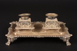 A George V silver twin bottle inkstandhallmarked London 1911, with floral decorated gadrooned
