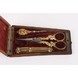 An 18th century French etui
containing sewing accessories with gold coloured handles including