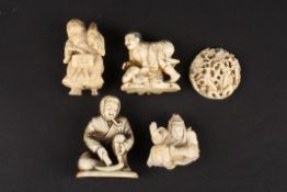 A collection of Oriental bone and ivory carvings including a Japanese figural netsuke, a small