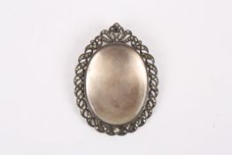 An early 20th century French silver and marcasite miniature photograph frame pendant /broochof oval