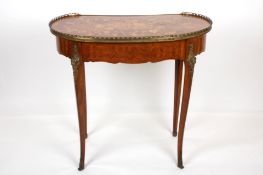 A 19th century style French marquetry and kingwood kidney shaped tablethe brass galleried top