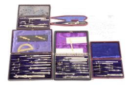 A collection of five sets of assorted drawings instrumentslate 19th and early 20th century