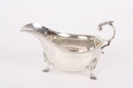 A George V silver sauce boathallmarked Sheffield 1931, with gadrooned rim and scrolled acanthus