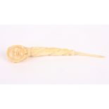 An unusual whale ivory crochet hook
with carved Eskimo head with fur hood, with twisted handle,