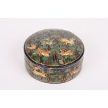 A mid 20th century Persian circular lacquered box and cover
the domed lid and body painted with deer