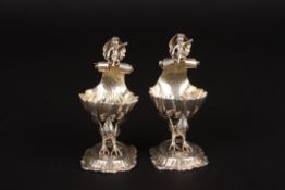 A pair of Victorian Continental silver shell shaped salts
hallmarked London 1891, formed as shells