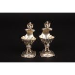 A pair of Victorian Continental silver shell shaped salts
hallmarked London 1891, formed as shells
