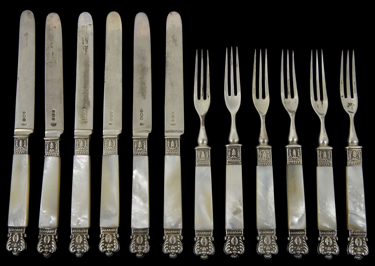 A set of six Victorian silver and mother of pearl handled dessert knives and forks hallmarked