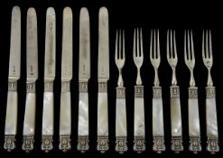 A set of six Victorian silver and mother of pearl handled dessert knives and forks hallmarked