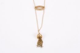 An unusual and delicate Edwardian gold and seed pearl sautoire necklace, the pearl set fancy