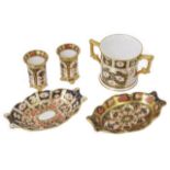 A Royal Crown Derby two handled christening mug together with a pair of miniature cylindrical vases,