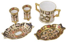 A Royal Crown Derby two handled christening mug together with a pair of miniature cylindrical vases,