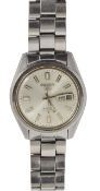 A Seiko automatic stainless steel wrist watch the silvered dial with luminous baton numerals and