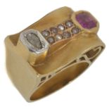 A large Continental Art Deco ruby diamond and pearl set cocktail ring the yellow metal mount of