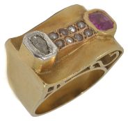 A large Continental Art Deco ruby diamond and pearl set cocktail ring the yellow metal mount of