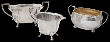 A matching hallmarked silver creamer and twin handled sugar basin hallmarked Sheffield 1946 maker
