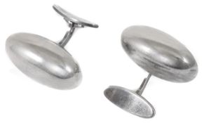 A pair of Georg Jensen silver 'torpedo' shaped cufflinks, fully marked Measure 3cms. in