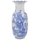 A large late 19th century Japanese blue and white vase the body painted with partridges surrounded