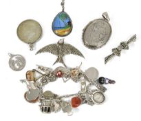 A small collection of mixed silver jewellery, including a fancy link charm bracelet, a large