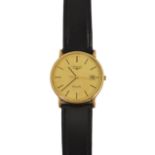 A 9ct gold Rotary wrist watch the textured dial with applied numerals on a 9ct gold strap,