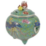A 20th century Chinese famille rose incense burner and cover the lid crested with a dog of foe,