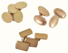 A pair of Georg Jensen hallmarked 9ct gold polished, oval cufflinks with simple scroll decoration, a