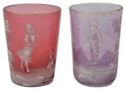 Two Victorian Mary Gregory cranberry glass beakers painted with children in white enamel. 7.5 cm