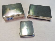 Two engine turned silver cigarette boxes together with a silver cigarette case. (3) 19.3 ozt total.