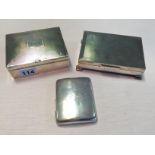 Two engine turned silver cigarette boxes together with a silver cigarette case. (3) 19.3 ozt total.