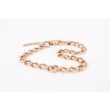 A 9ct rose gold curb link bracelet converted from an Albert chain. Approx weight 12.9 gmCondition: