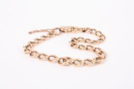 A 9ct rose gold curb link bracelet converted from an Albert chain. Approx weight 12.9 gmCondition: