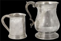 A hallmarked silver presentation tankard inscribed and dated 28th Sep 1948 together with another