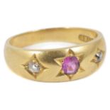 A Victorian ruby and diamond three stone gypsy ring. 18ct gold mount Condition: overall good